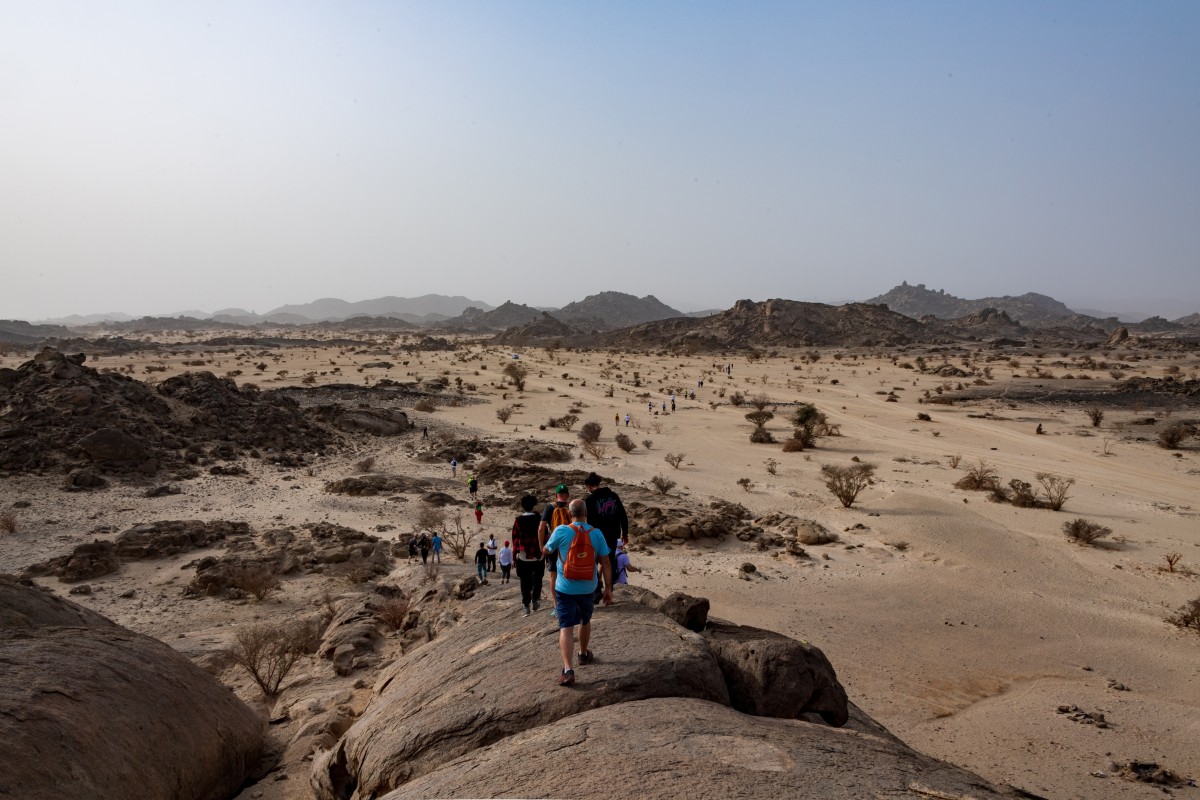Trek across the rocks of Jeddah's nearby desert before spending a night under the stars