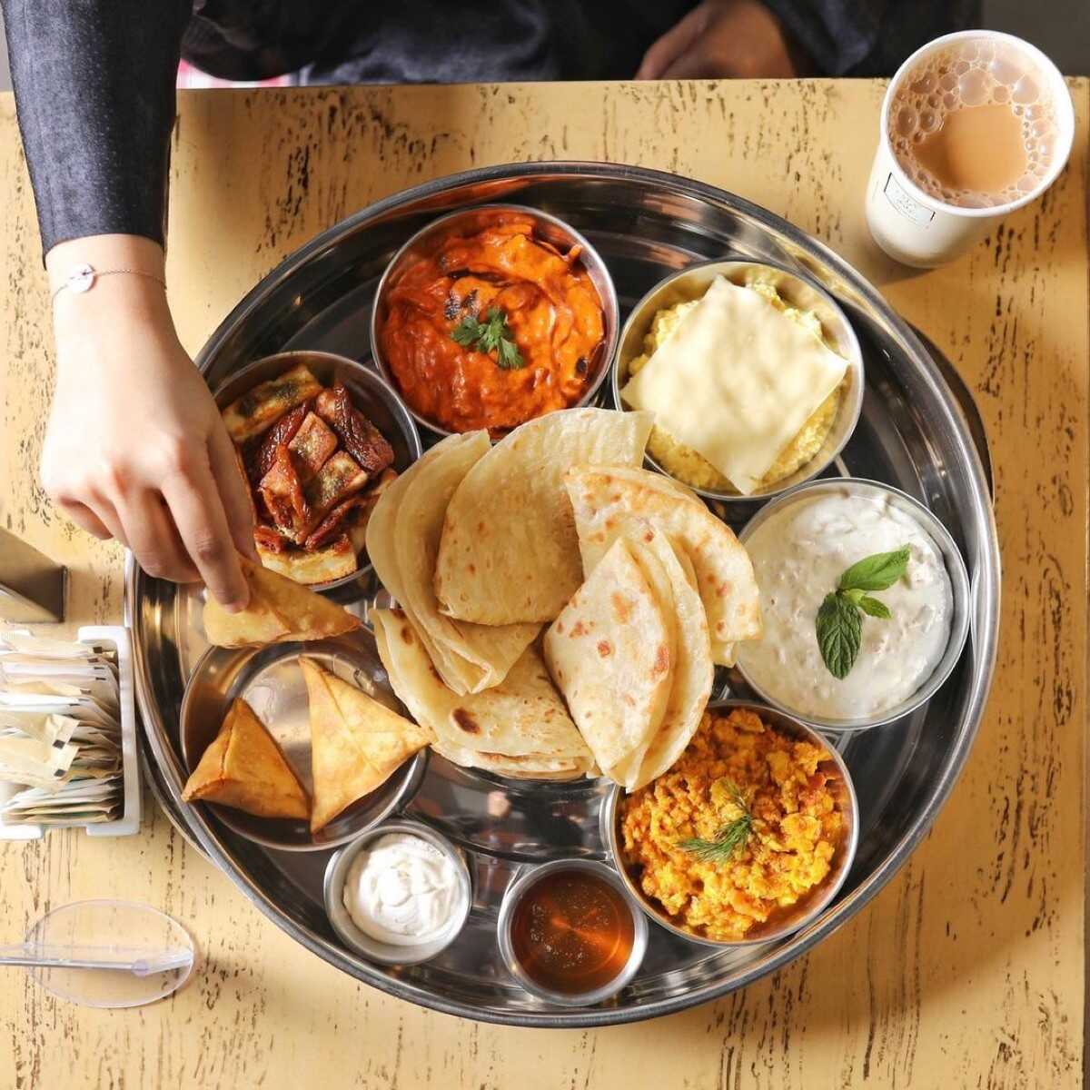 Head to Karak Gholam and have a breakfast feast with your cup of karak