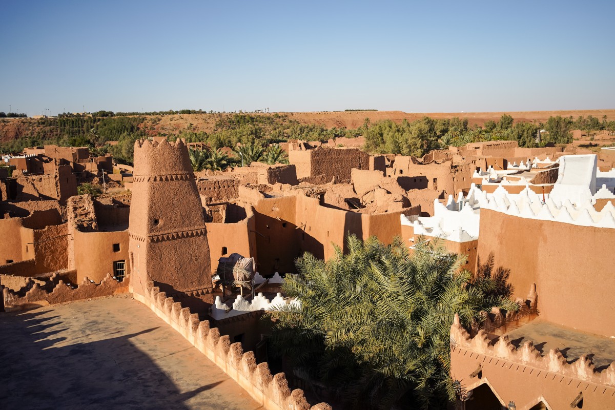 Wander among the traditional houses made with mud in Ushaiqer Heritage Village