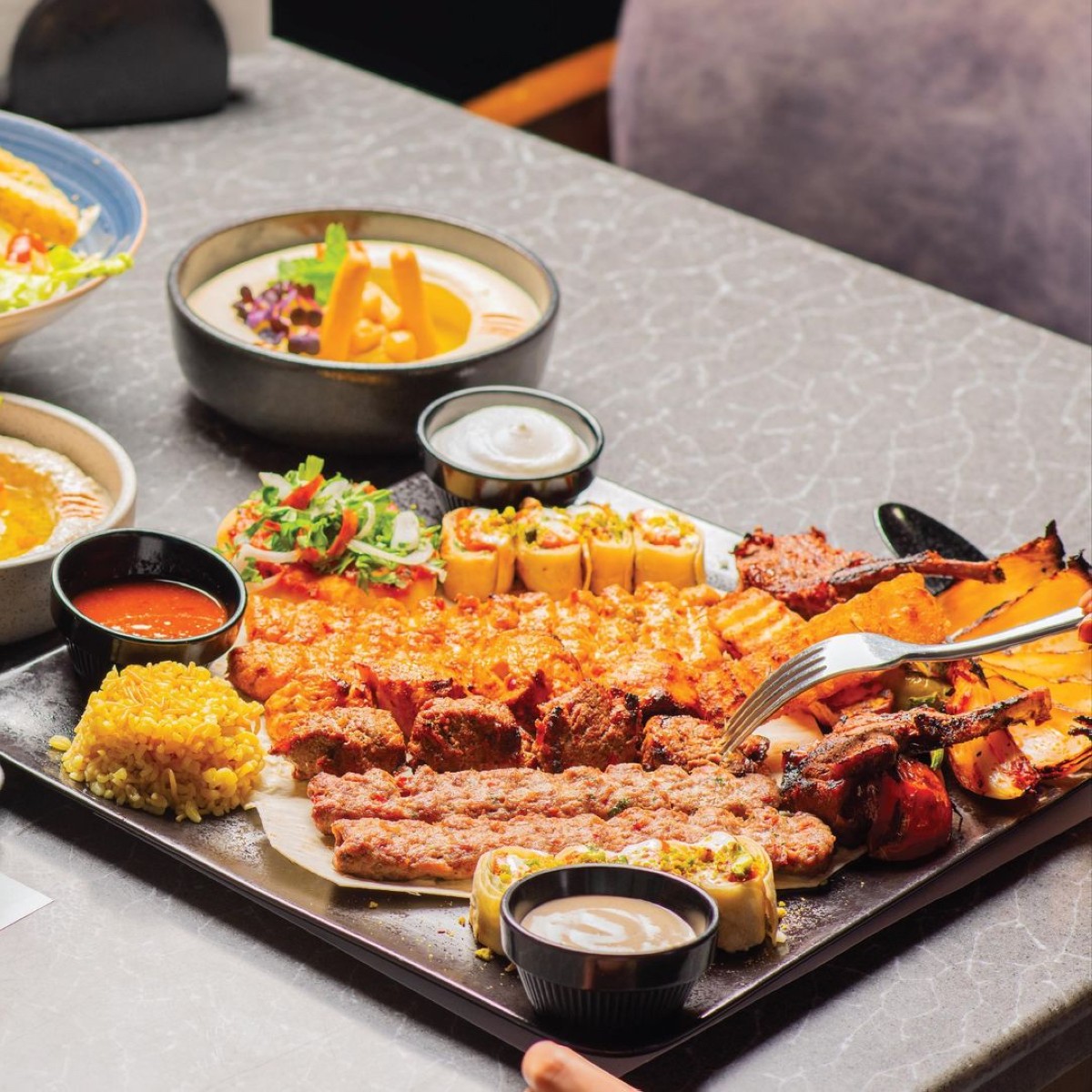 Ariba Lounge often has a live DJ to entertain guests as they dine 