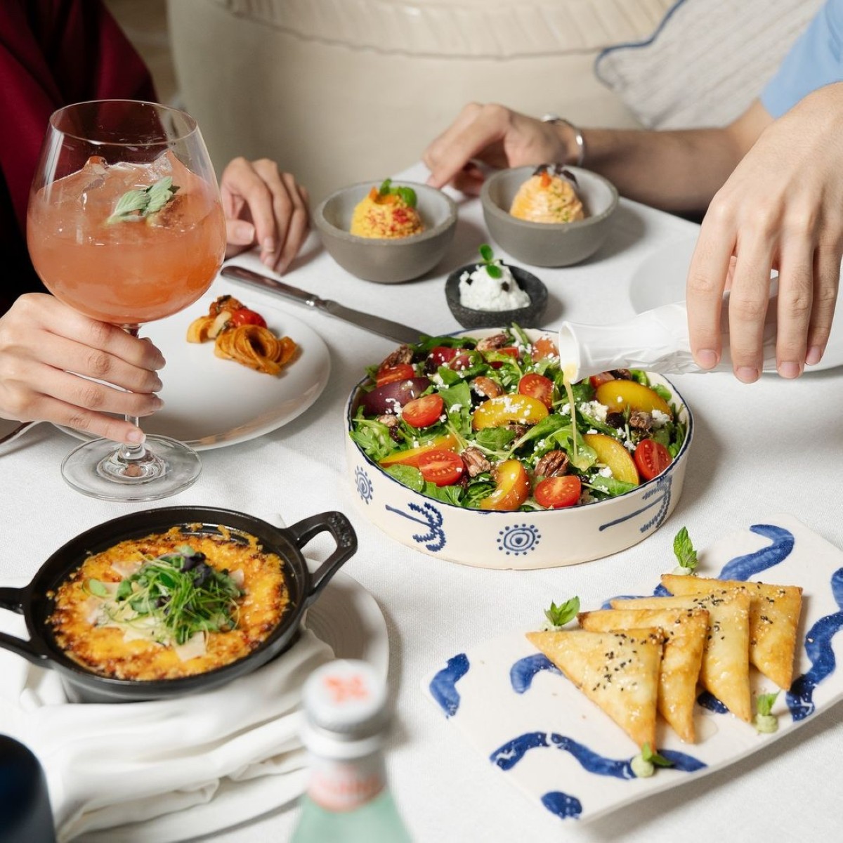 Transport yourself to a Greek island paradise with dinner at Hellenika