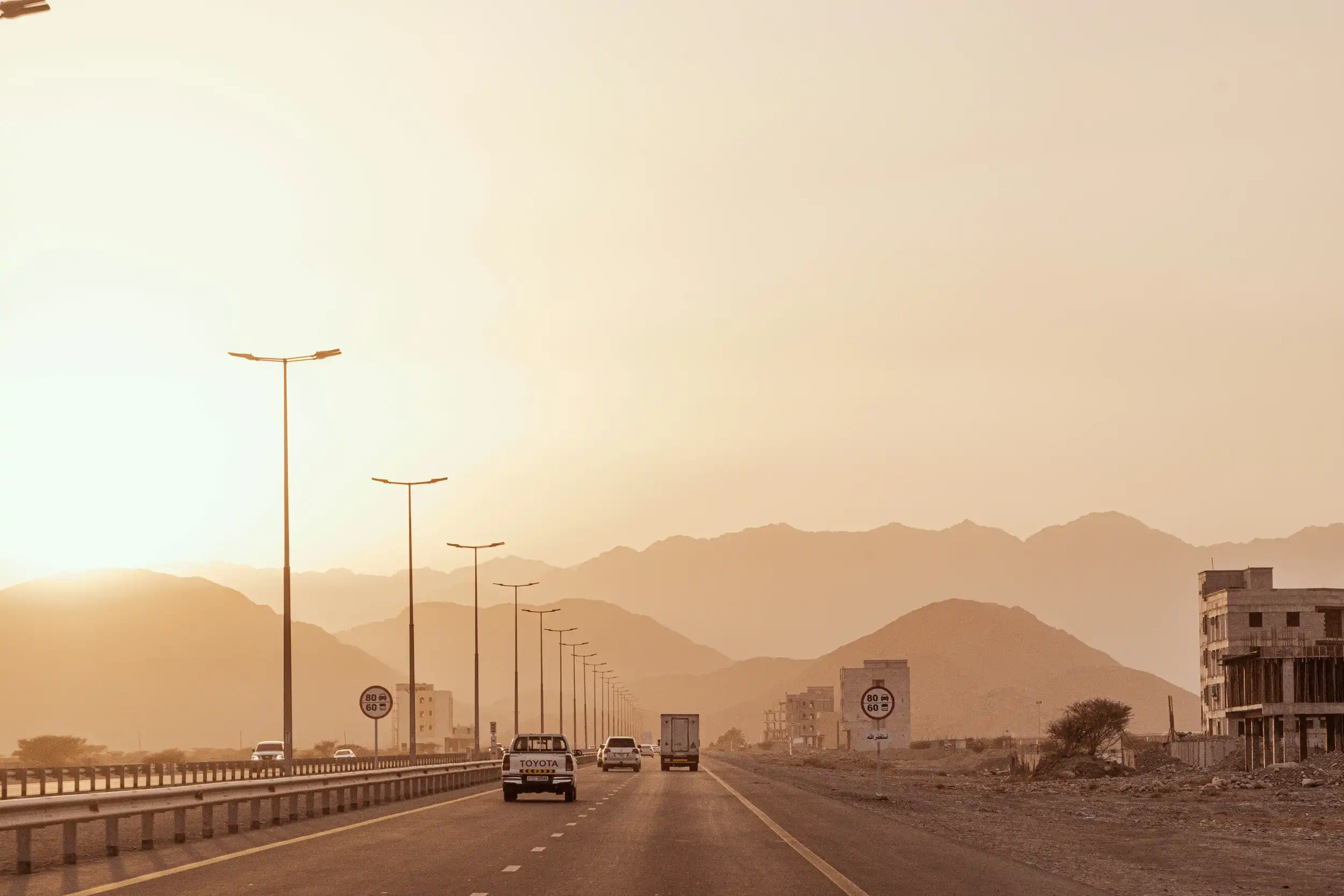 A road through the desert hills in Sharjah. Unsplash