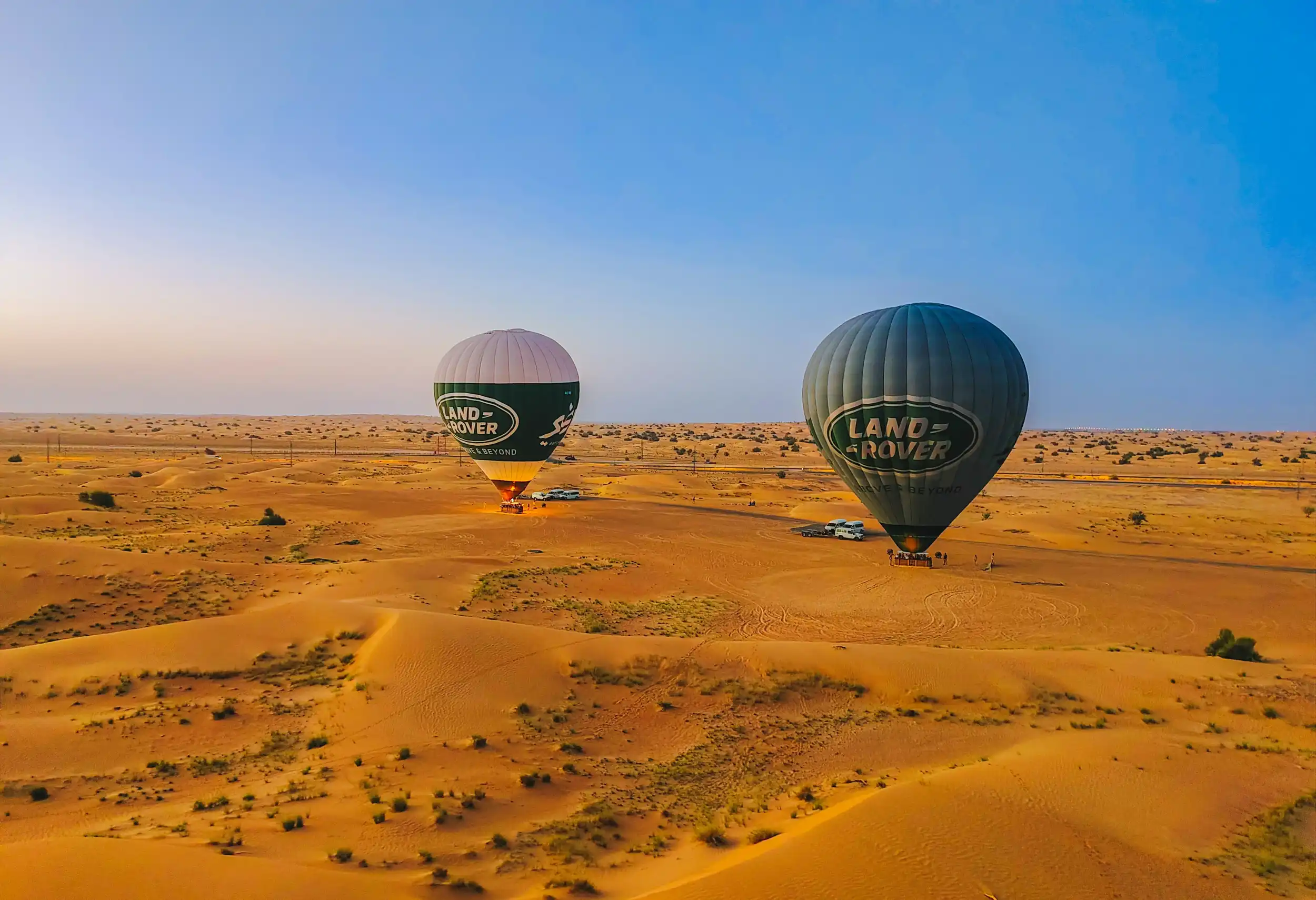 Hot air balloons above the desert. Unsplash