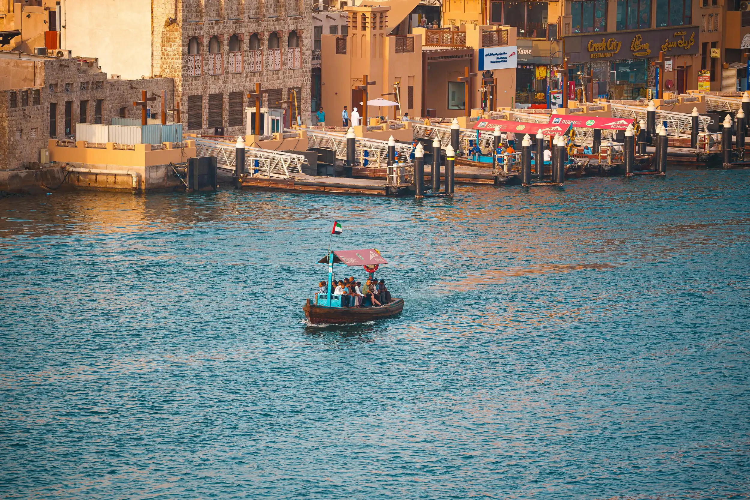 A dhow crossing the water in Dubai Marina. Pexels