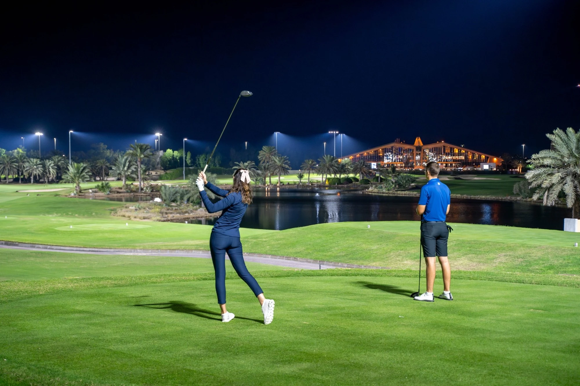 Golfing at night in Abu Dhabi