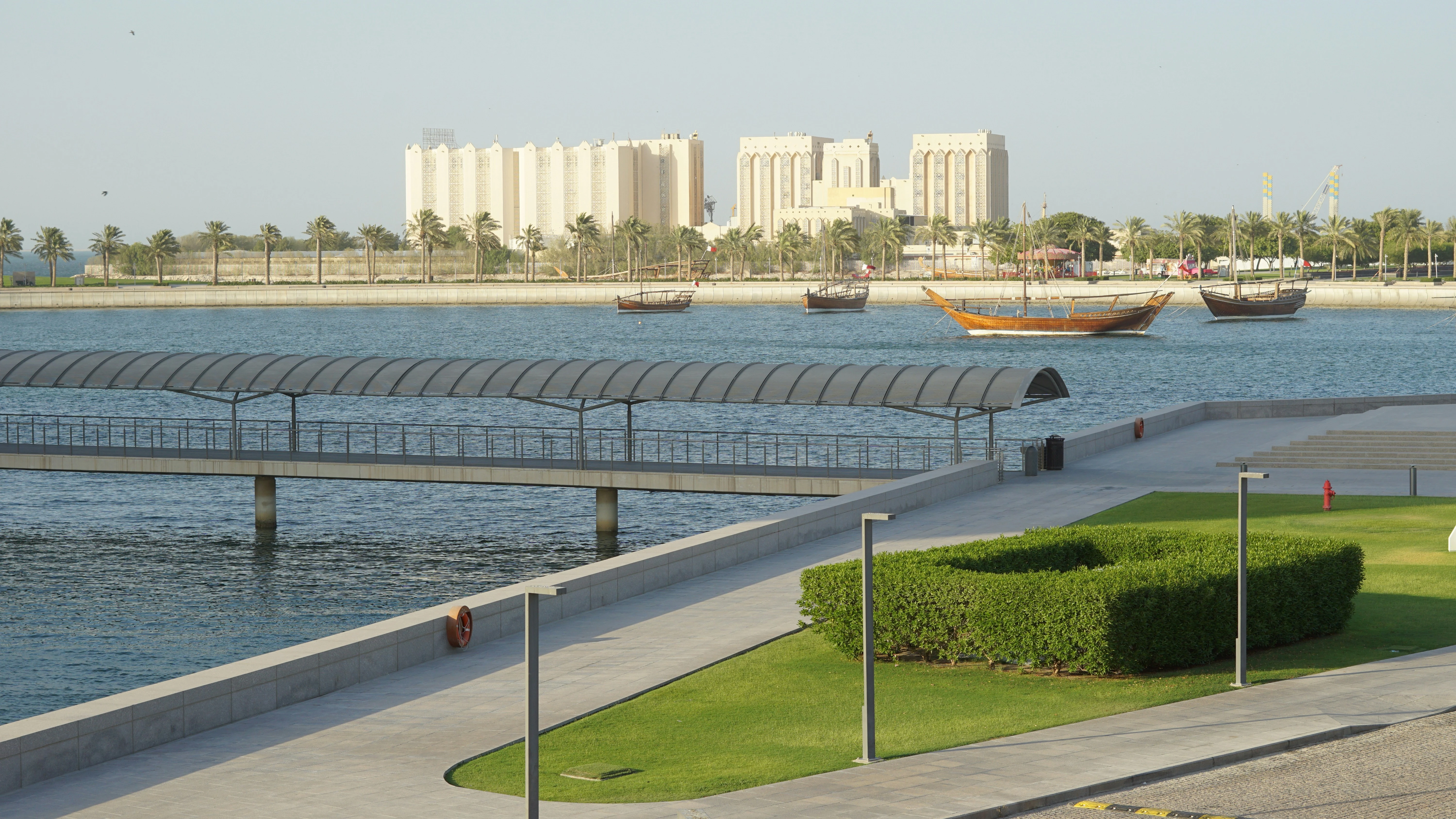 Traditional boats in Doha's harbour. Unsplash