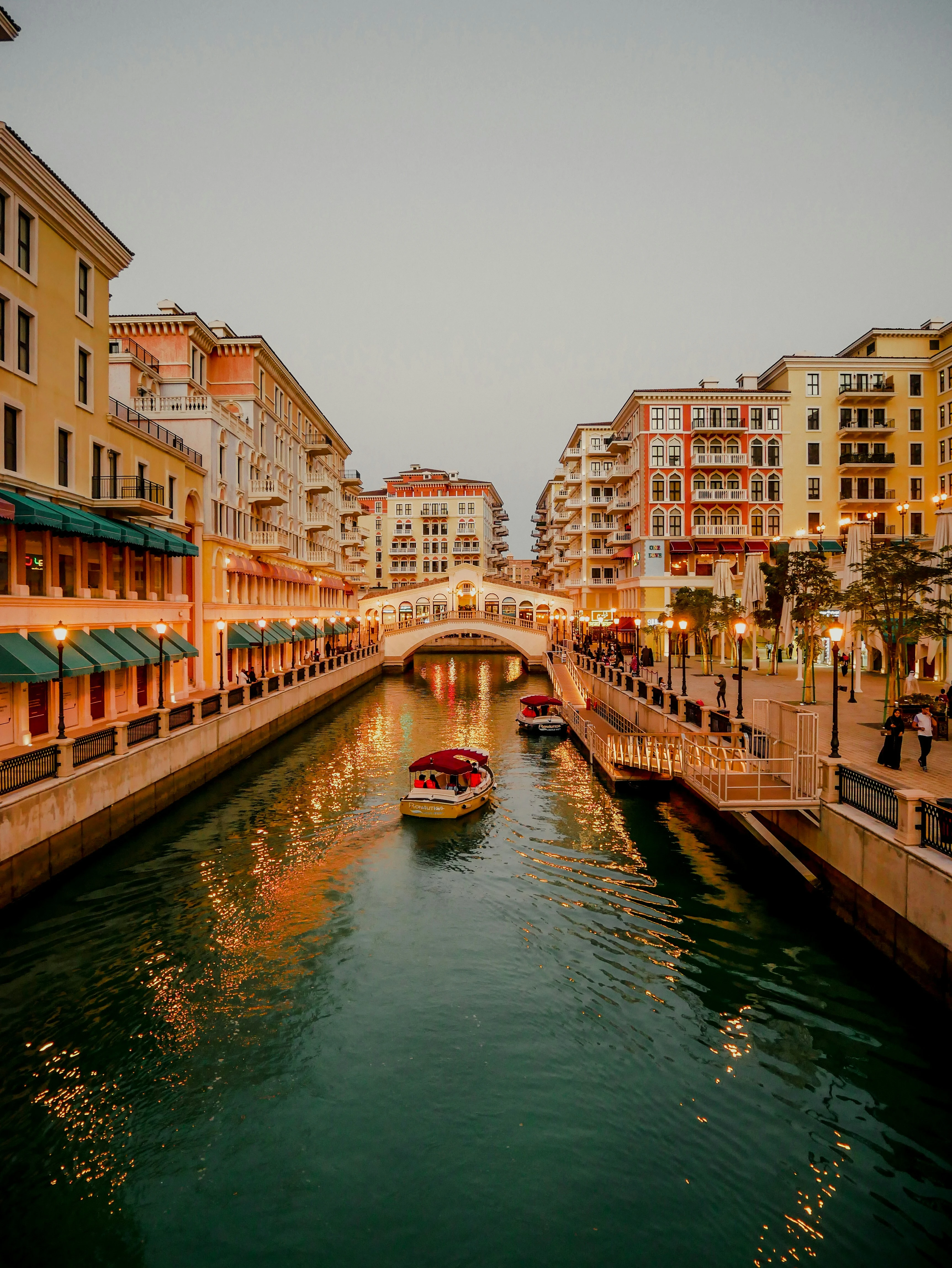 Sunset dhow ride in Qanat Quartier. Unsplash