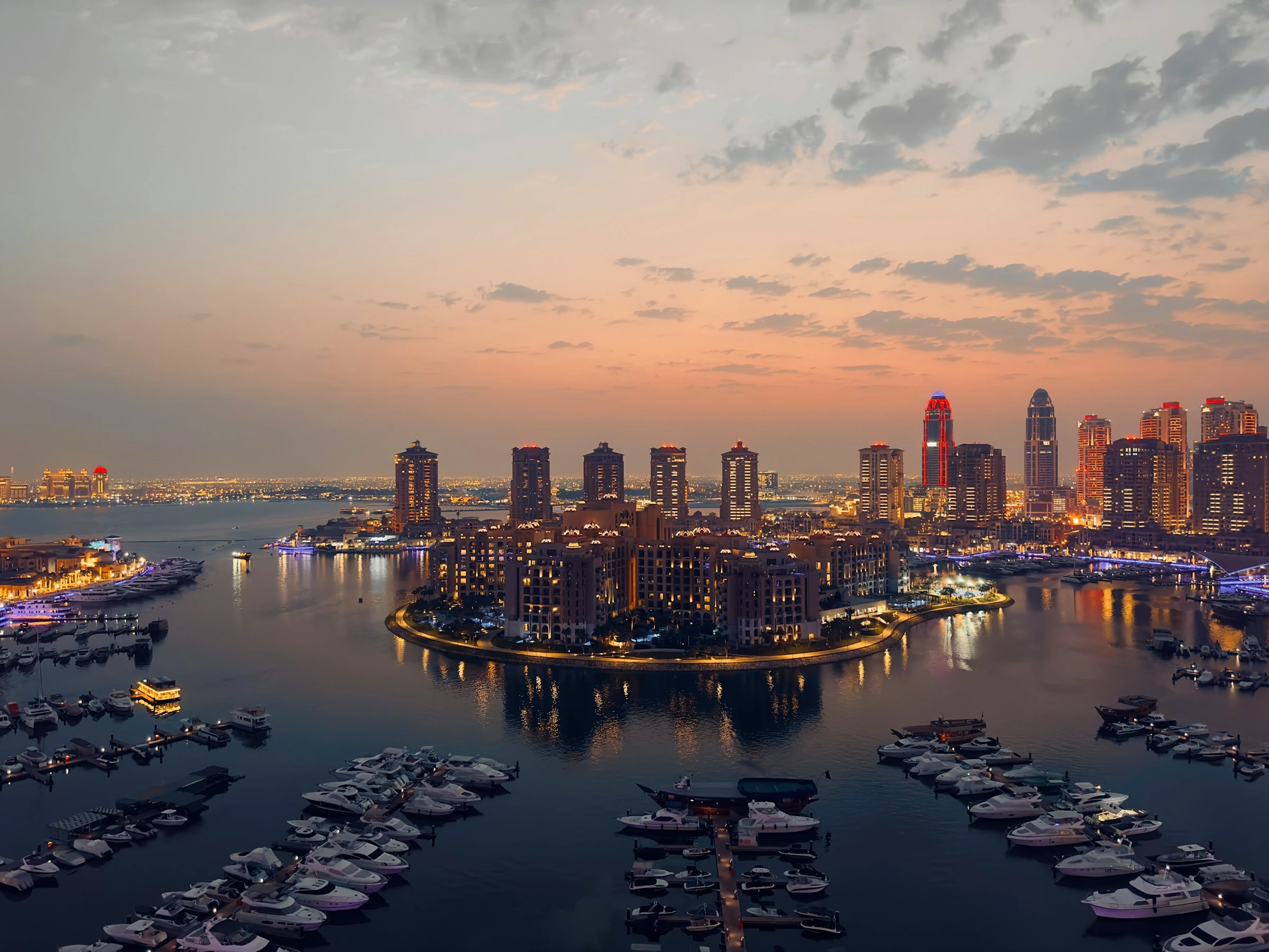 Aerial view of The Pearl in Doha at dusk. Unsplash
