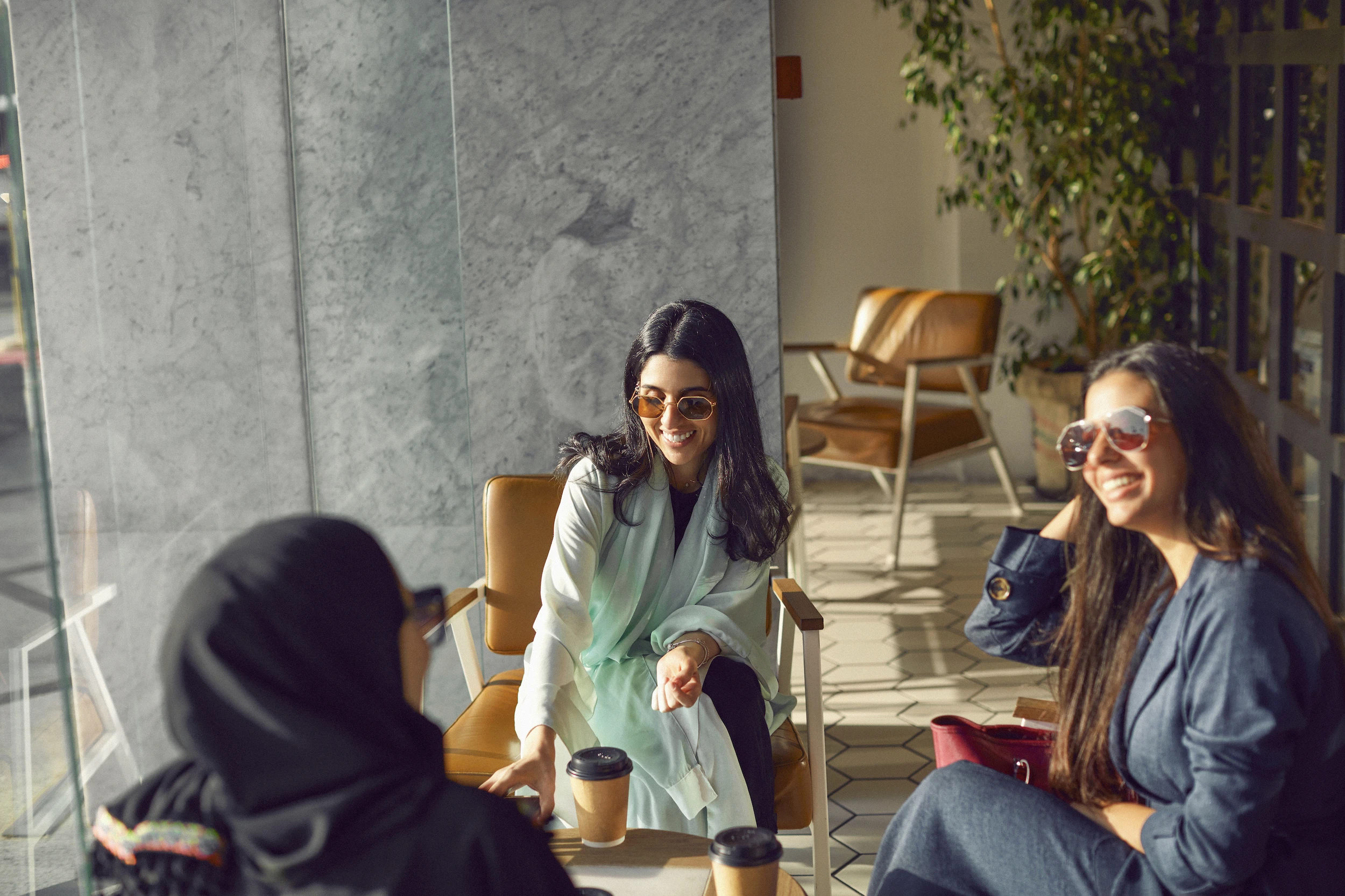 Friends enjoying coffee at a cafe in Riyadh. STA
