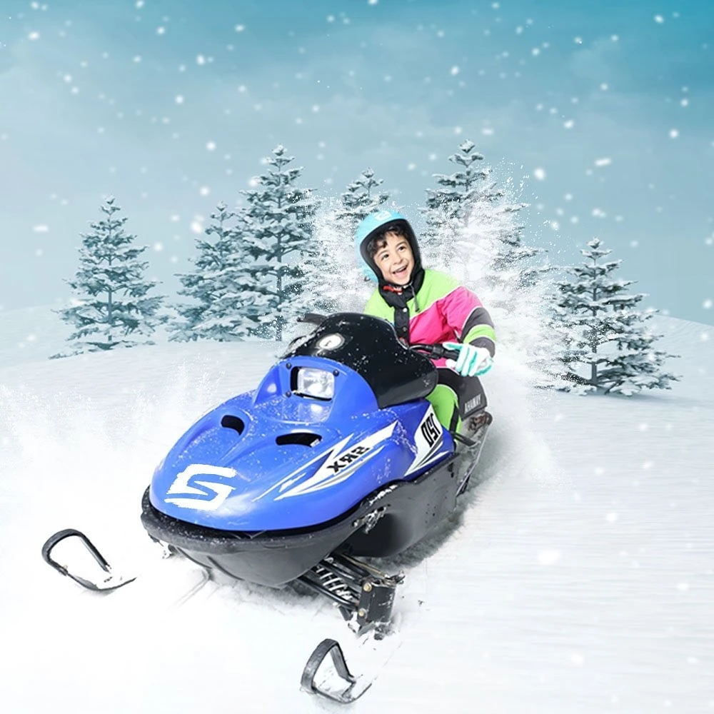 A child on a snowmobile at Snow City, Riyadh