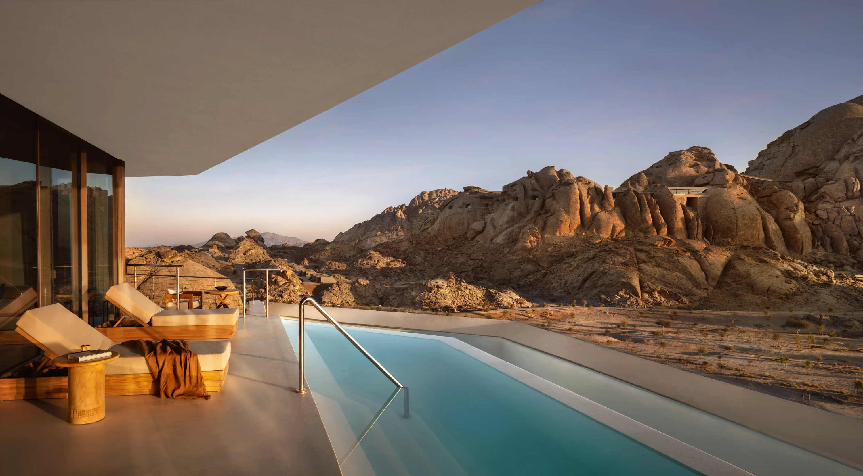 A villa with a pool and views of the desert at Desert Rock